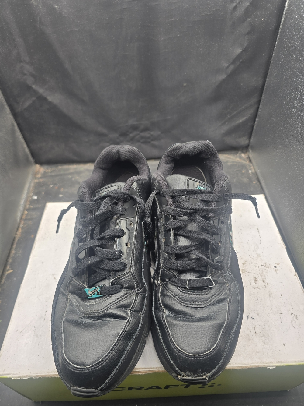 Nike Men's Black Athletic Sneakers with Teal Accent